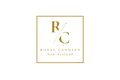 A square white card or logo print featuring a gold border, a stylized 'RC' monogram with a star, and the text 'ROYAL CANDLES New Zealand'.