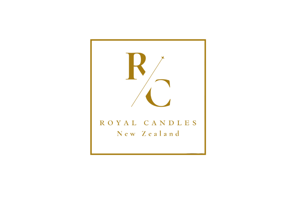 A square white card or logo print featuring a gold border, a stylized 'RC' monogram with a star, and the text 'ROYAL CANDLES New Zealand'.